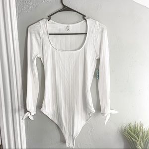 Free People NWT Move On Ivory Knot Long Sleeve Bodysuit